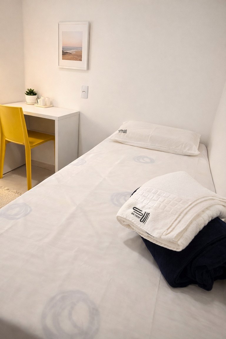 Quarto duplo com duas camas individuais