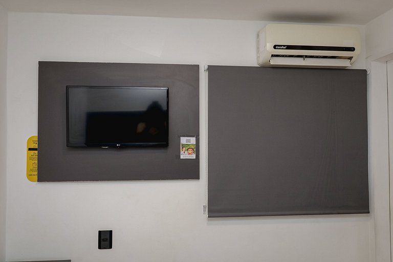 Quarto individual com uma cama de solteiro